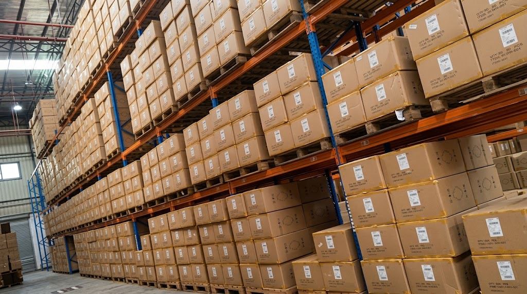 Cartons on pallet racks